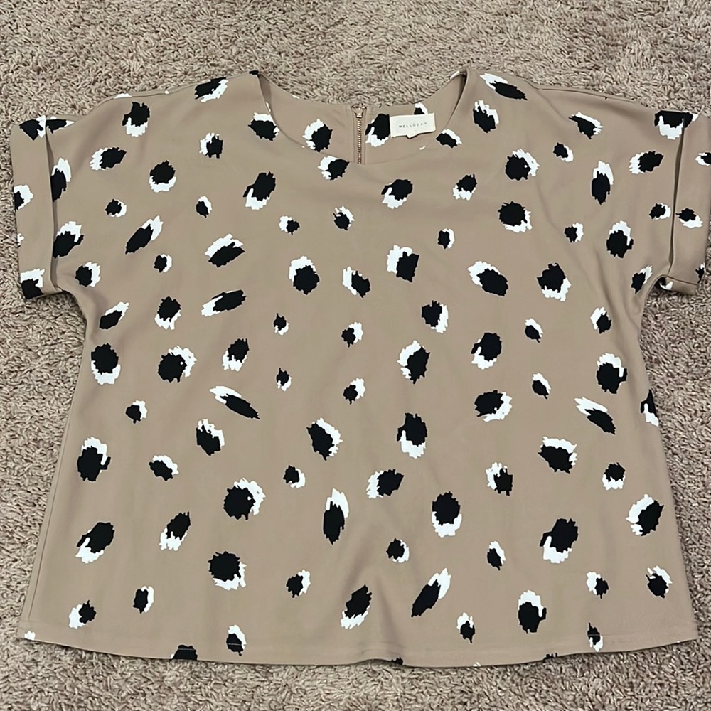 Tan, black and white work top perfect for dressing up or down!